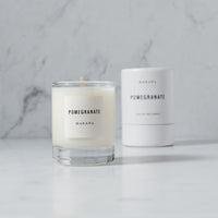 Makana's Pomegranate scented candle perfect for the Holidays is now available in their Petite Candle line.